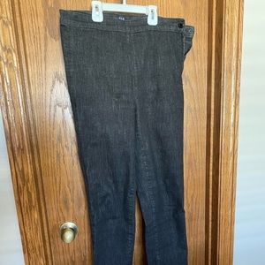 Black side-zip skinny jeans; size 29 Tall